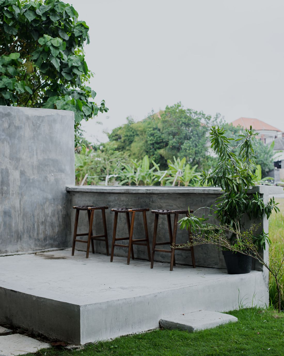 Outdoor concrete patio surface prepared for a protective coating